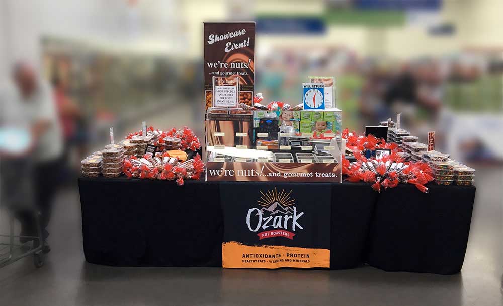 Display showing the Ozark Nut Roasters setup at Sam's Club